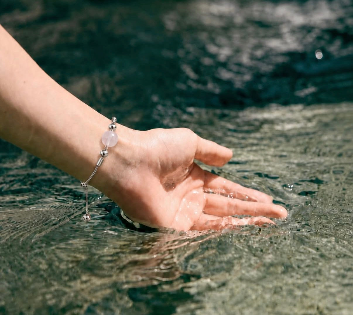 Adiaro bracelet near water