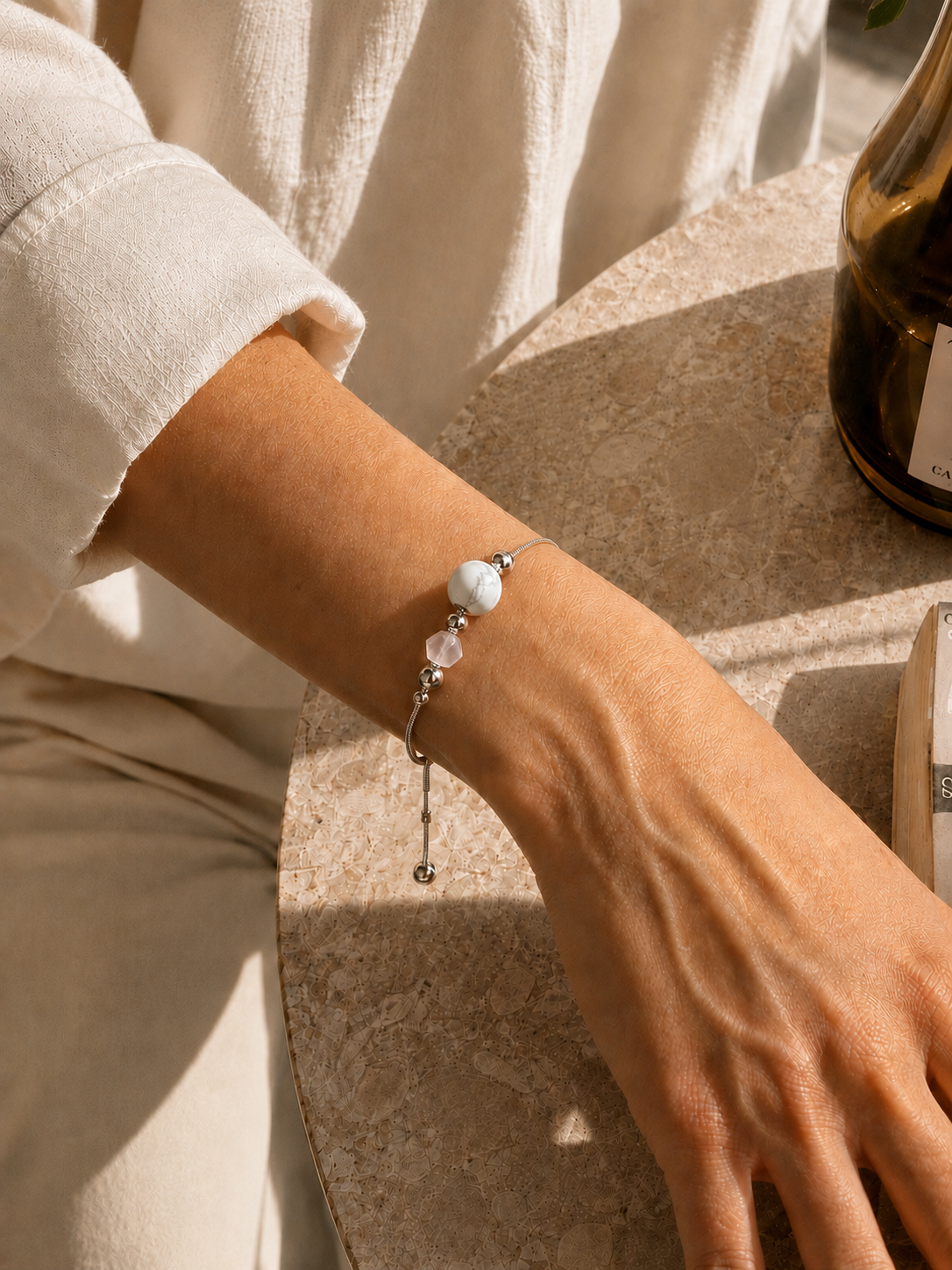 Model wearing an Adiaro tiger eye bracelet